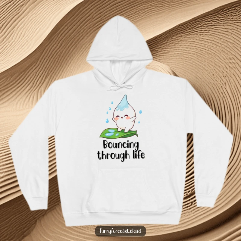 Funny Hoodie with a cute, smiling raindrop happily bouncing on a lush green leaf, perfect for cozy, cheerful days.