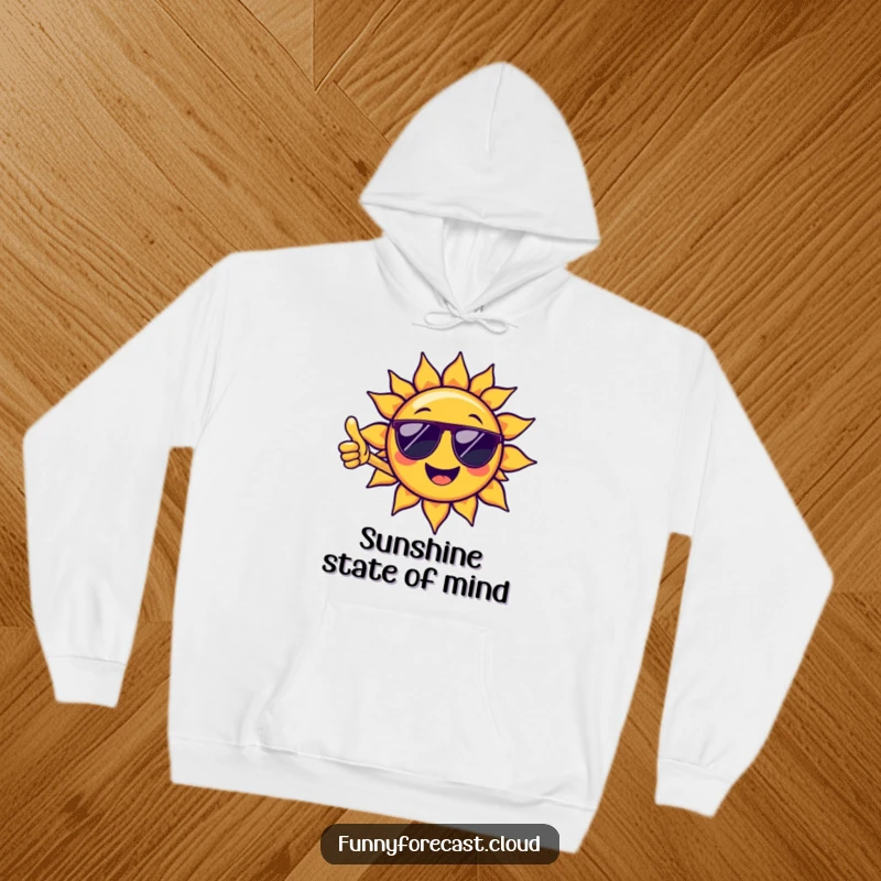 Funny hoodie displaying a chill sun character with sunglasses, giving a thumbs-up, ideal for warm comfort and funny gifting.