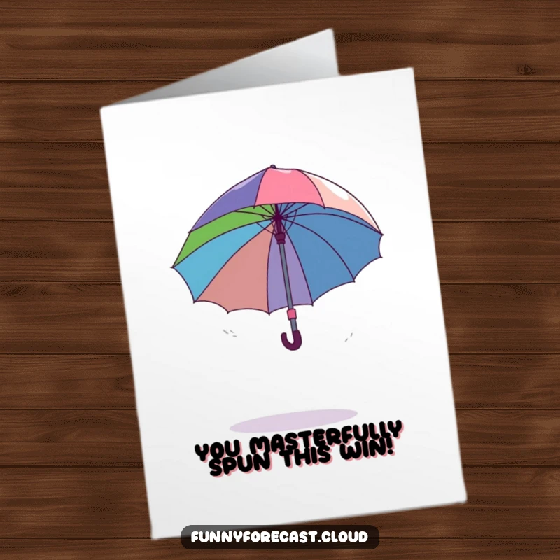 Funny Free Printable Congratulations Card: An umbrella comically spinning completely out of control in a light, playful breeze.