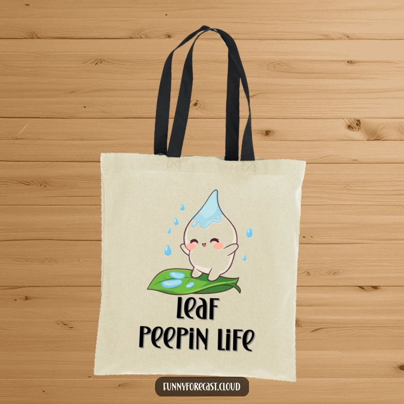 Funny Tote Bag featuring a cute raindrop character gleefully bouncing on a leaf, adding a playful touch to any outing.